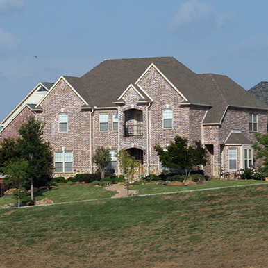 Exterior of brick home in Arlington by Platinum Painting