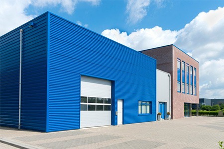 A commercial building that has been painted blue