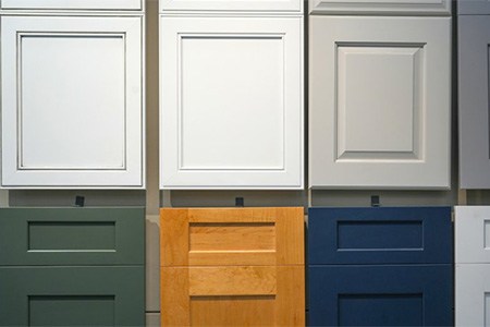 A series of cabinets with different paint colors