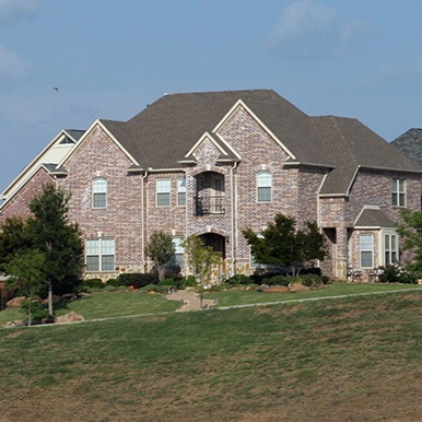 Exterior of brick home in Pantego by Platinum Painting