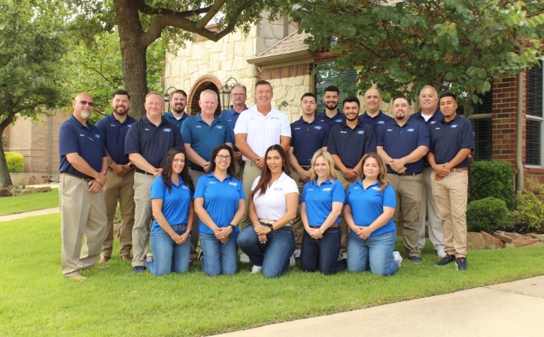 team members smiling together in arlington