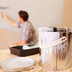 Man painting a wall