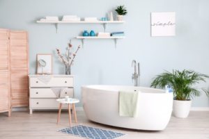 a clean bathroom painted light blue 