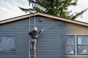 a painter working on a commercial space